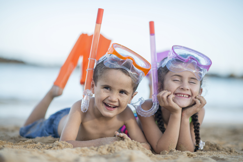 kids hanging out snorkeling in maui